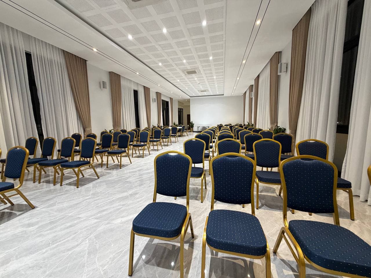 Rows of seats in the Osea Hotel meeting room