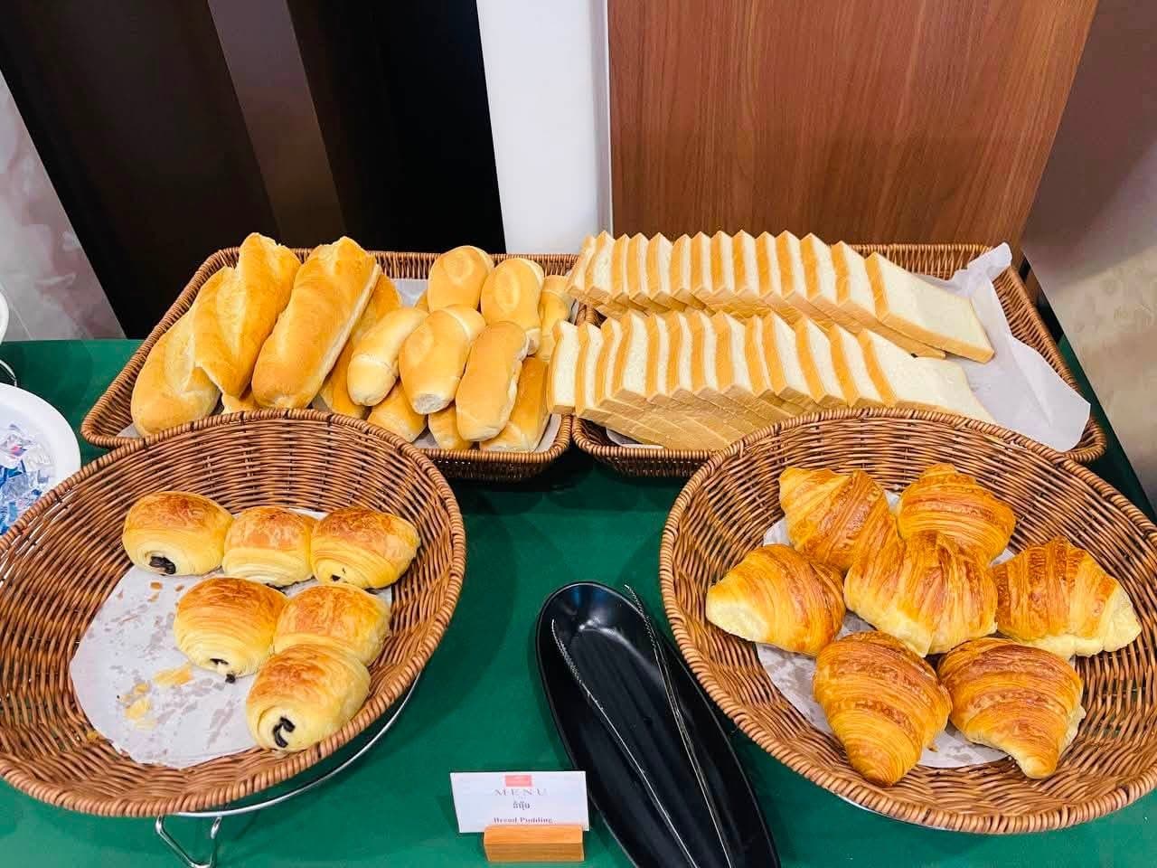 Bread and pastries laid out at the Osea breakfast buffet
